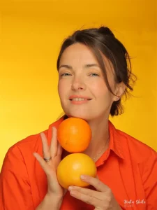 Portrait avec des oranges