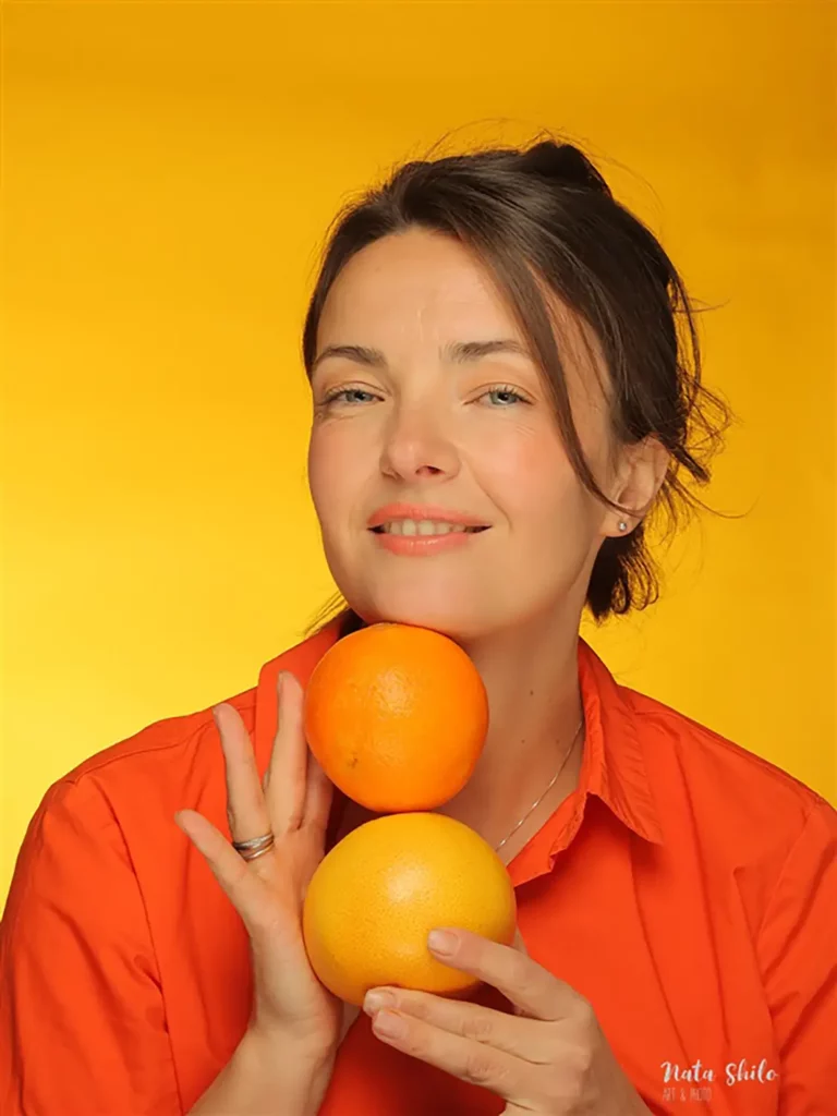 Portrait avec des oranges
